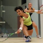 Nicolette Fernandes (front) goes down to England's Laura Massaro 5-11, 5-11, 7-11 in the CIMB Malaysian Open