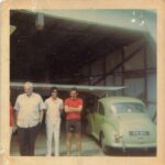 george grandsoult and a young ray lowe in his hangar at ogle