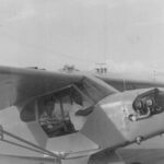 Alex Phillips at the controls of a Piper Aircraft