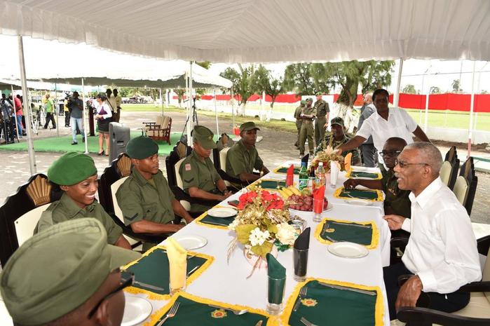 President Granger shares a light moment with some of the Officers of the GDF as Chief of Staff, Brigadier George Lewis looks on